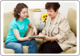 Caregiver teaching a child how to read