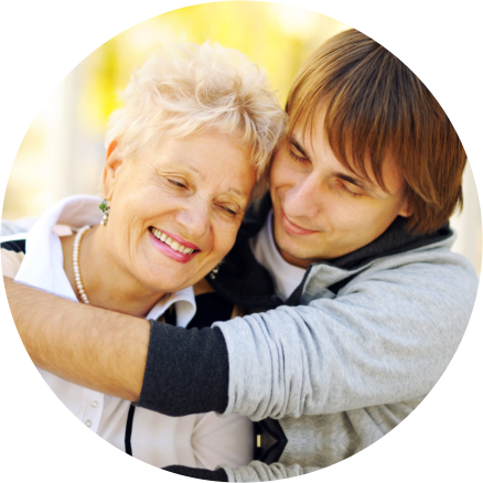 Caregiver hugging to an Elderly